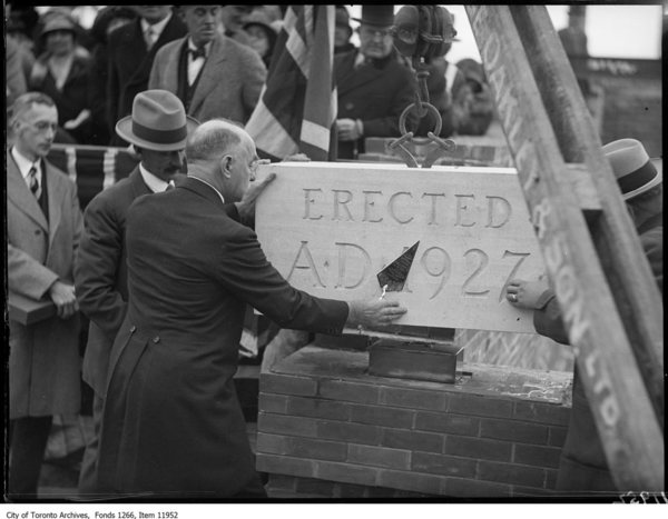 Original title:  Title: Toronto East Hospital, Mark Bredin laying cornerstone
Archival citation: Fonds 1266, Item 11952
Date(s) of creation of record(s): October 22, 1927
Physical description of record(s): 1 photonegative : b&w, glass ; 9 x 11 cm
Form of material: Photographs
Forms part of Fonds 1266; Globe and Mail fonds. 
https://gencat.eloquent-systems.com/city-of-toronto-archives-m-permalink.html?key=288363 